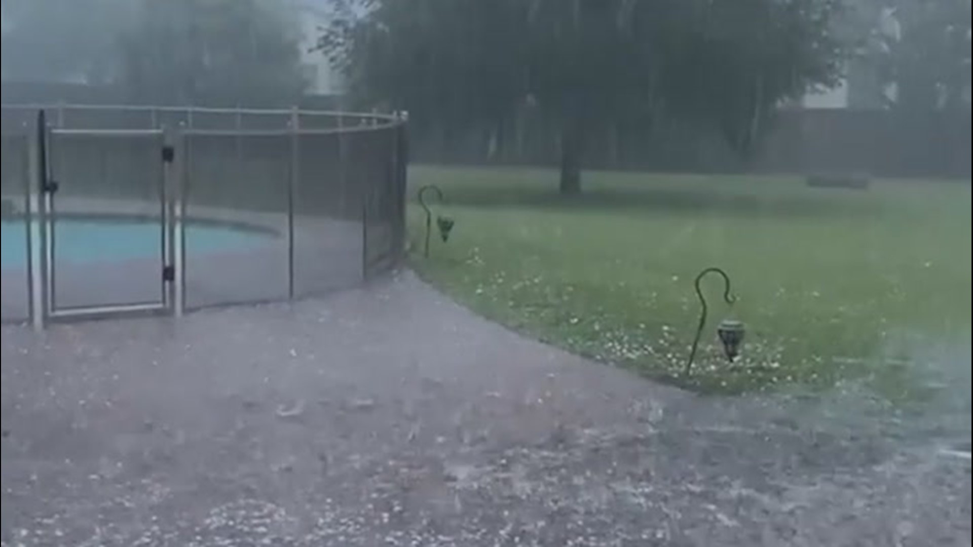 Severe weather brought heavy rain, hail and thunder to Waco, Texas, on April 19. The ground can be seen littered with hail as flooding begins to form.