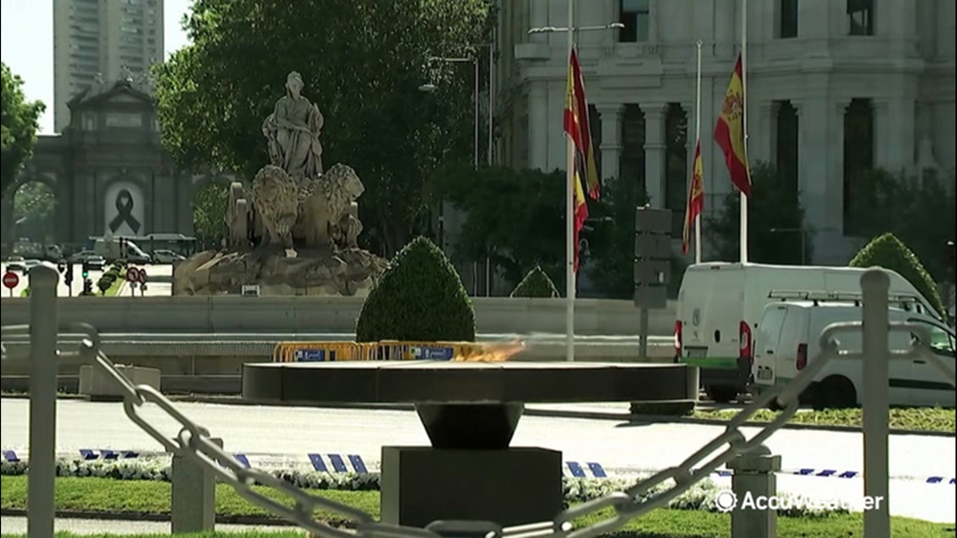As life returns to Madrid, Spain, people offered tributes on May 28 to those who died from COVID-19. Some tributes included burning flames, flowers and signs.