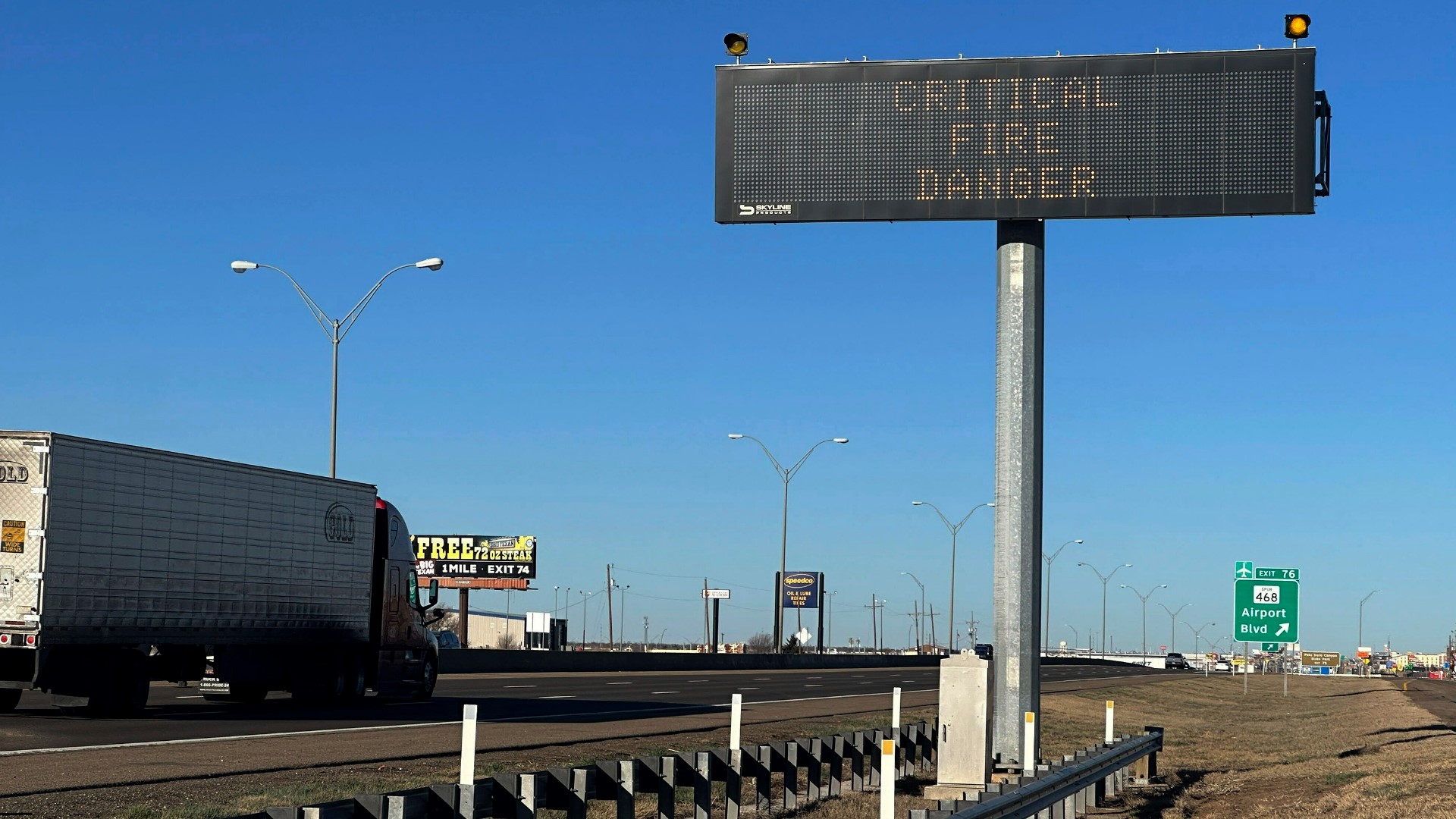 Texas firefighters battling wildfire face harsh weather conditions