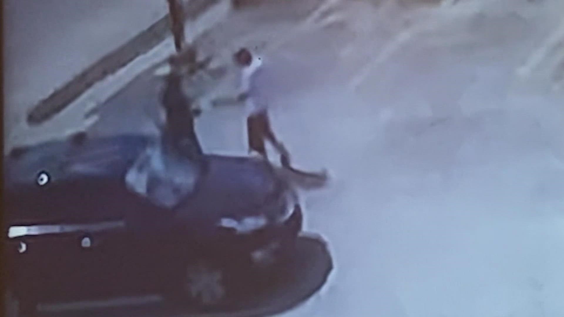 Surveillance video obtained by KHOU 11 News shows the moments Mike Essien was shot and his killer took off in the SUV with 2-year-old Micah in the backseat.