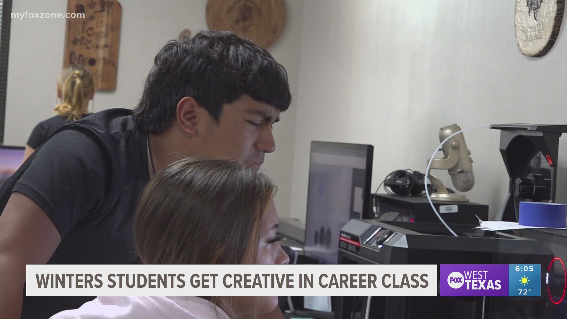 Students use a 3D laser printer for engraving designs. The class also designs and laminates posters which hang in the high school's halls.