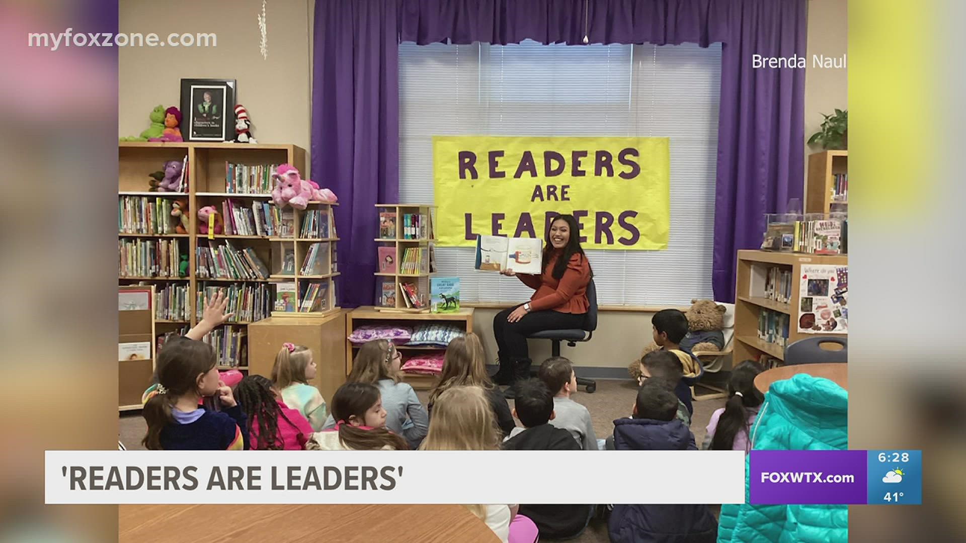 Esmeralda Perez and Symone Thomas read at Santa Rita Elementary for its 'Readers are leaders' program.
