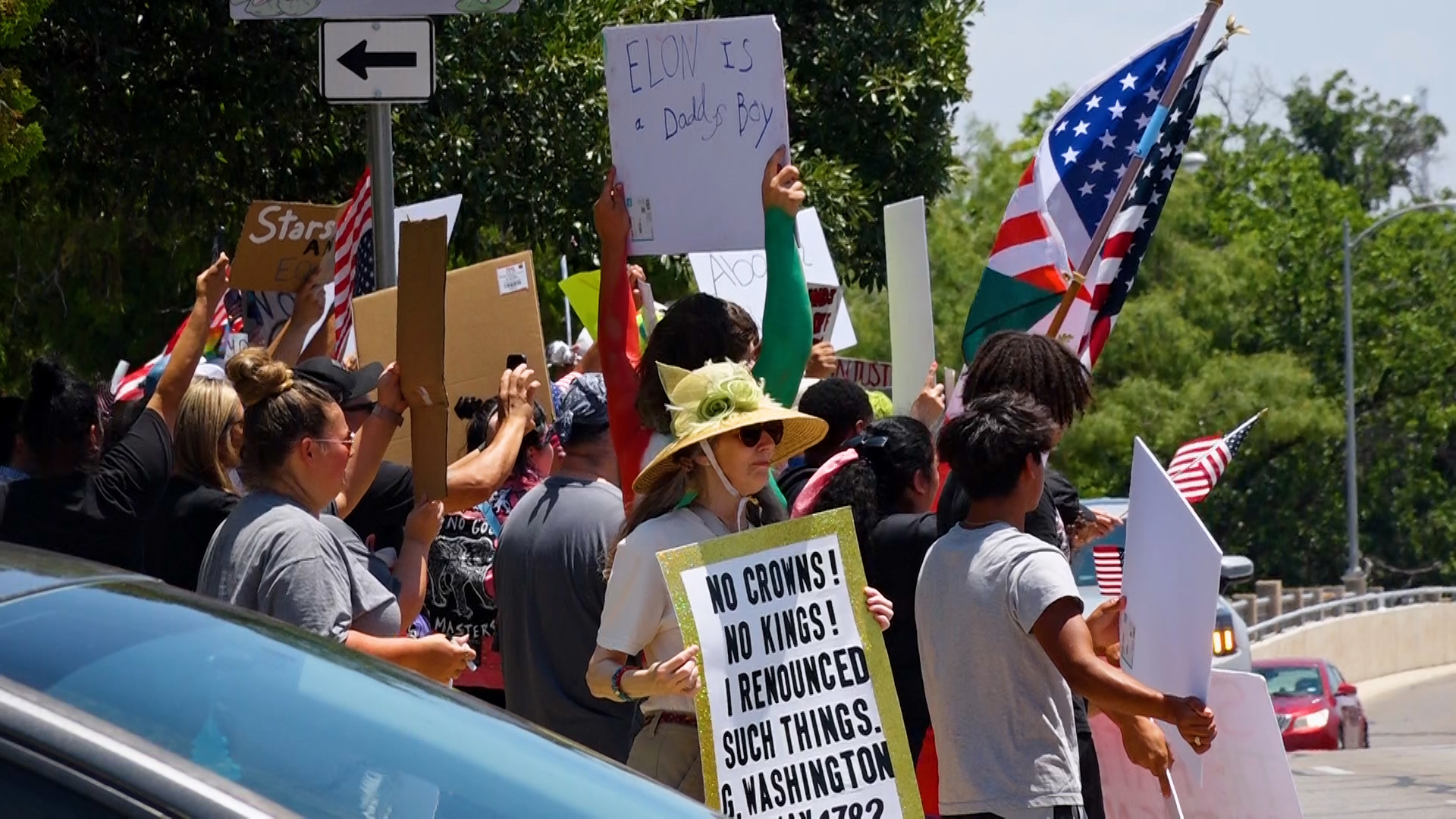 Hundreds gathered in Civic League Park Saturday in one of the nationwide Trump protests.