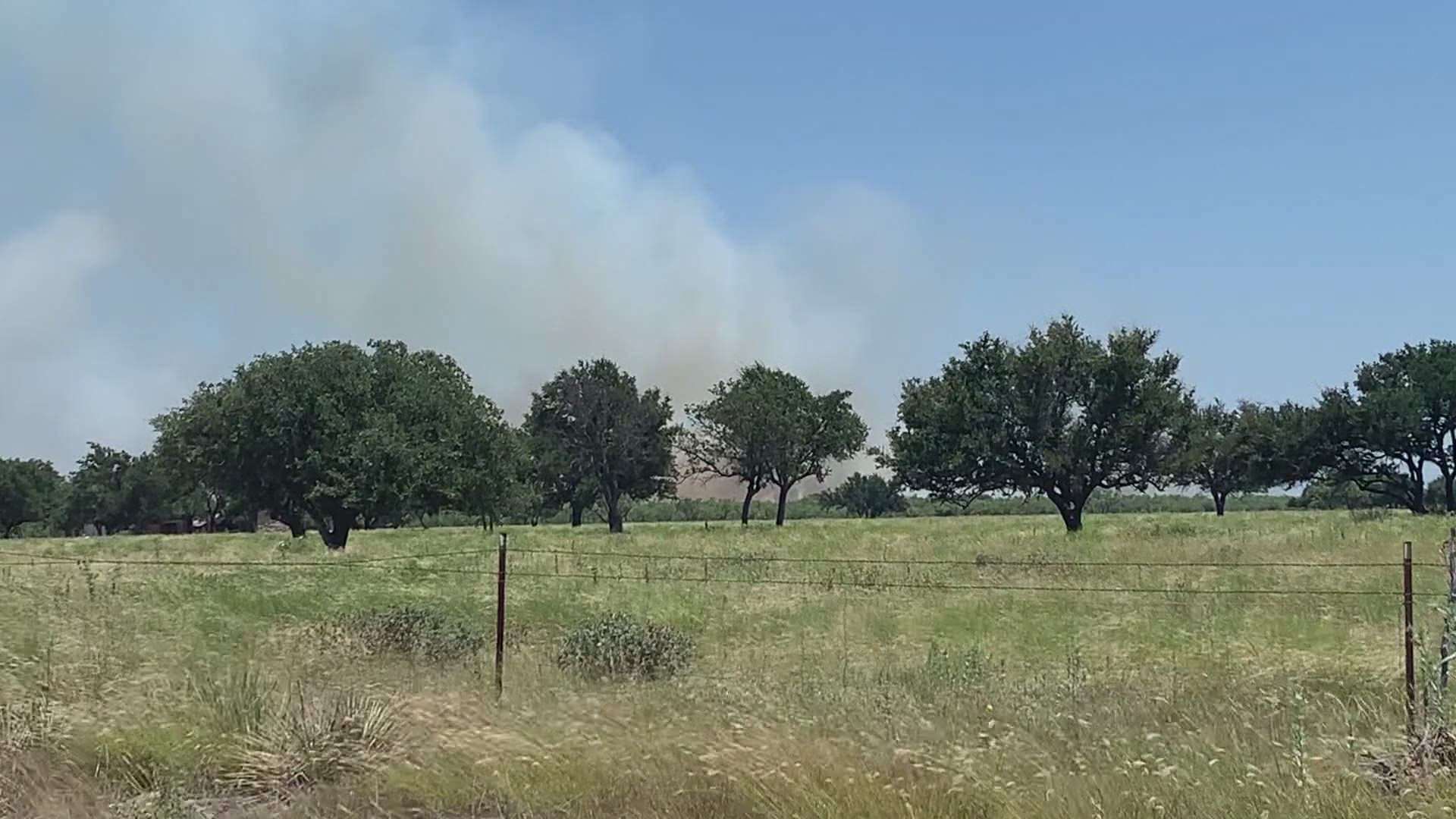 Multiple volunteer fire departments fought a large grass fire Friday afternoon off Mountain Road in Coke County.