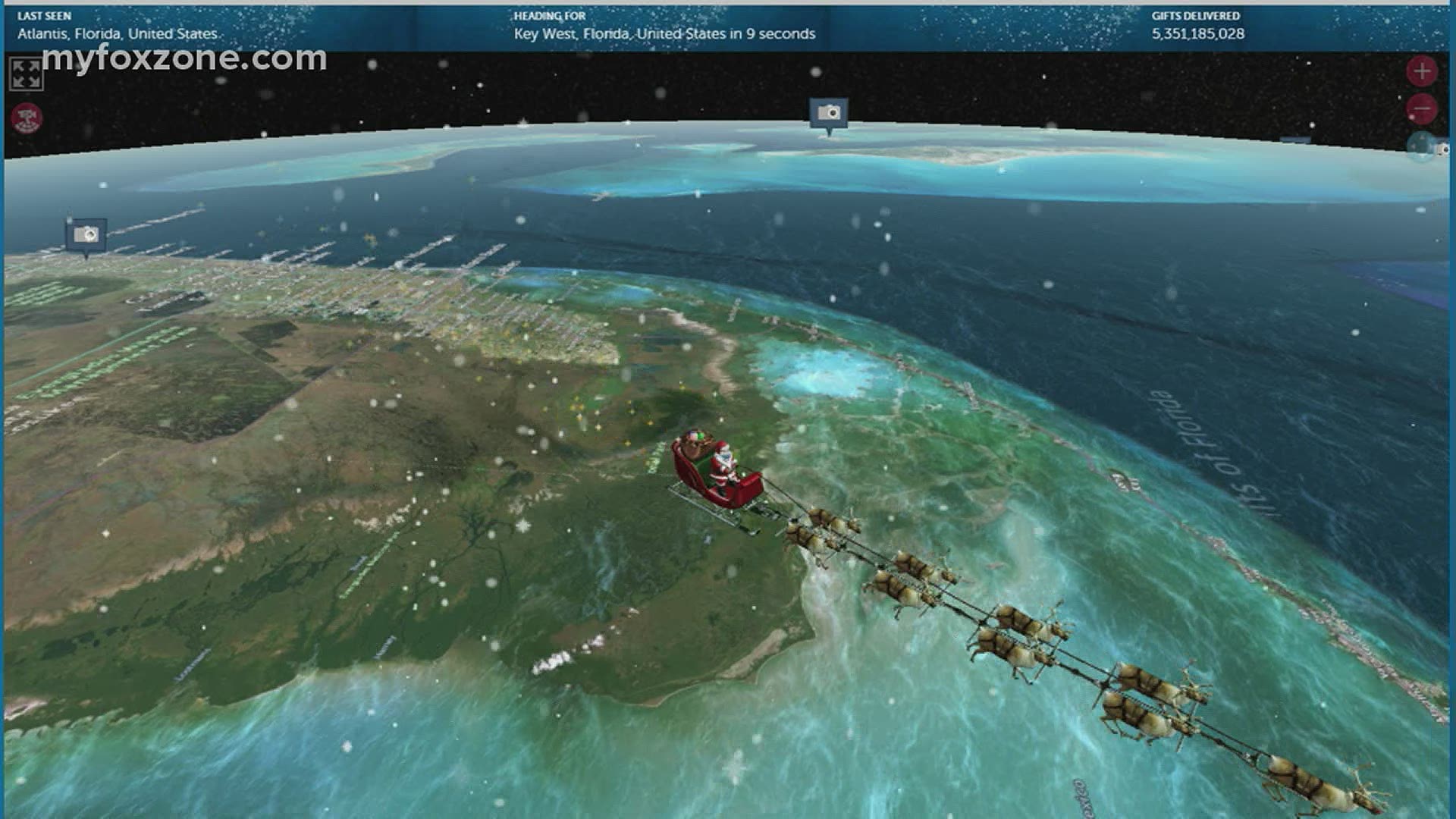 Joe DeCarlo and Tim O'Brien track Santa Claus as he makes his way into the United States.
