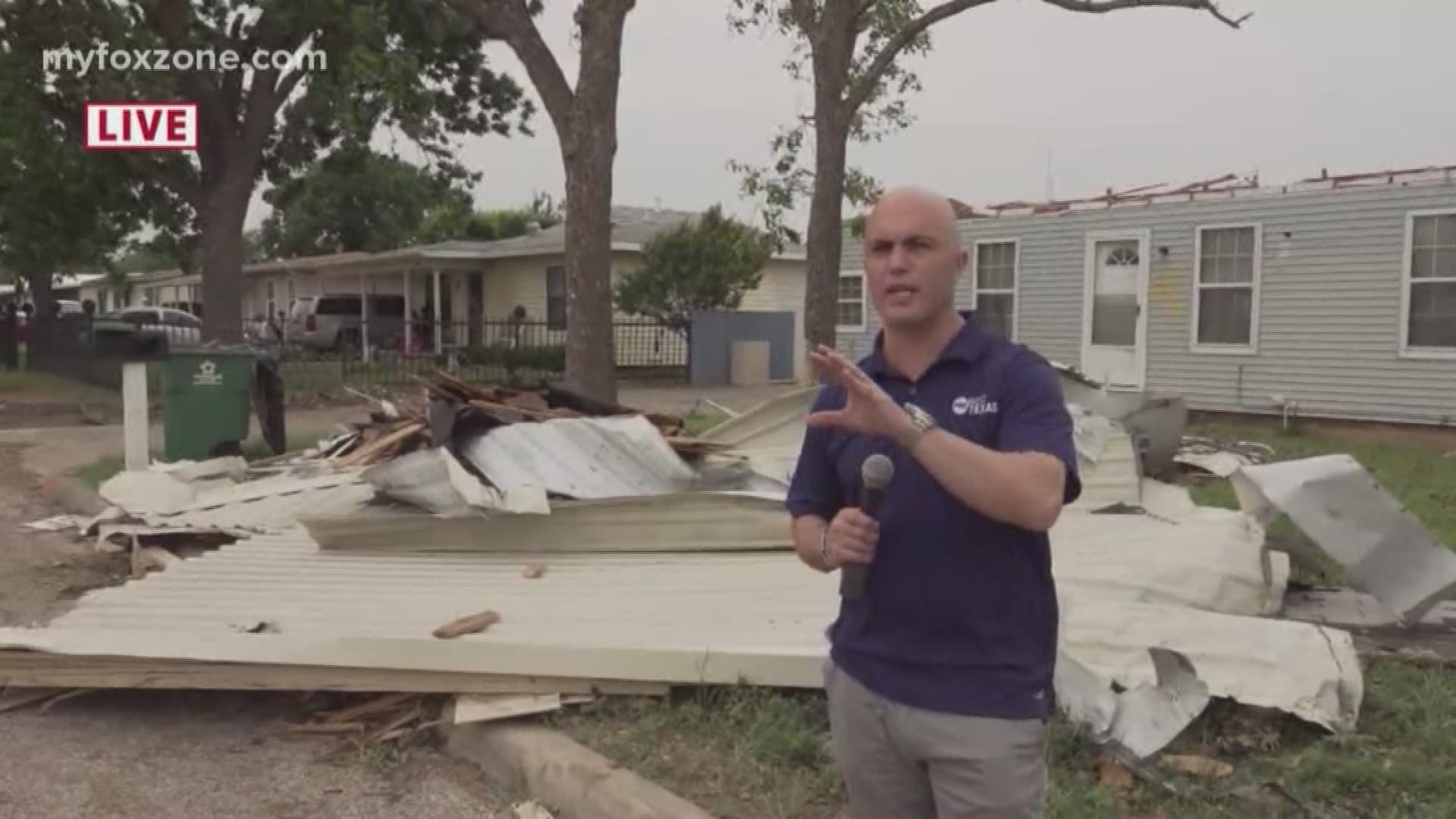 A local resident talks about the moment an EF2 tornado touched down in her neighborhood.