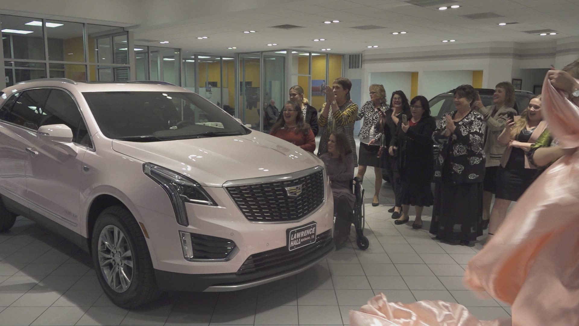 Mary Kay senior sales director awarded pink Cadillac.