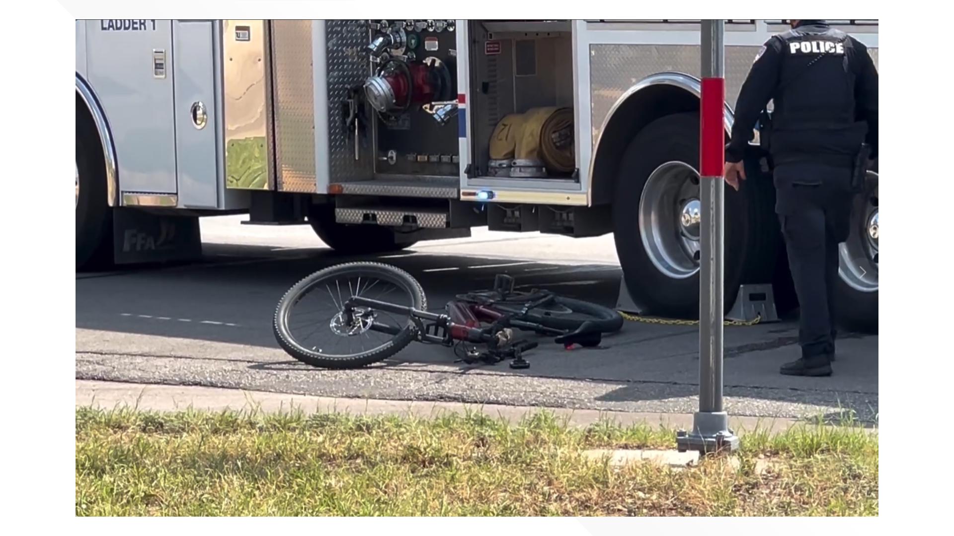 A bicycle rider struck the back of a passing vehicle at the intersection of South Abe Street and West Twohig Avenue Thursday afternoon.