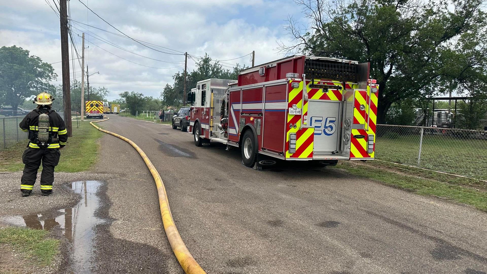 San Angelo FD crews work to extinguish fire at vacant trailer house on East 37th Street Thursday afternoon.
