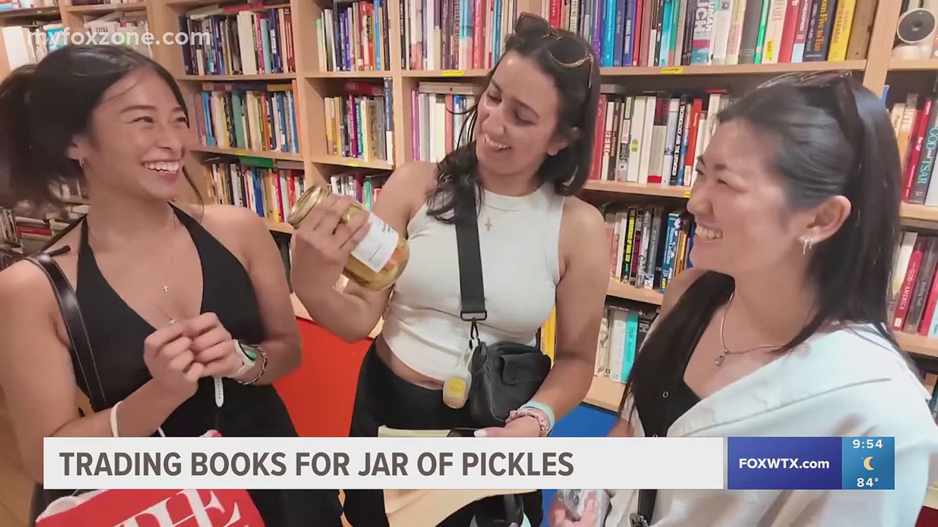 A pickle-shaped sign draws crowds to NYC's Sweet Pickle Books, where trading 5 books gets you a jar of pickles in this quirky Lower East Side shop.