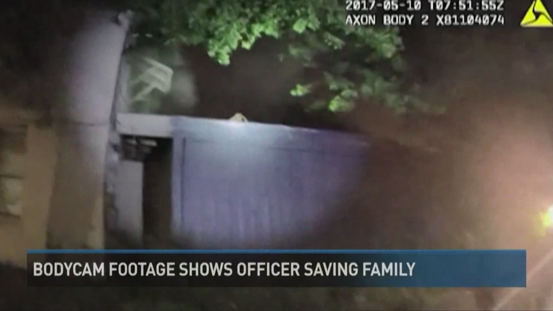Body cameras show how two San Antonio police officers help a family escape a burning apartment building.