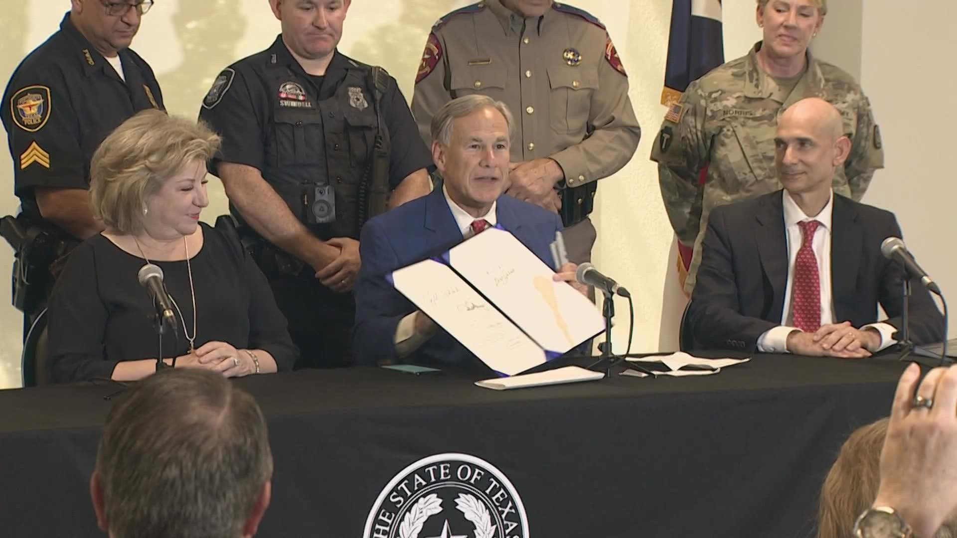 The humanitarian crisis is taking place as Gov. Greg Abbott signed a new law in Fort Worth on border security.