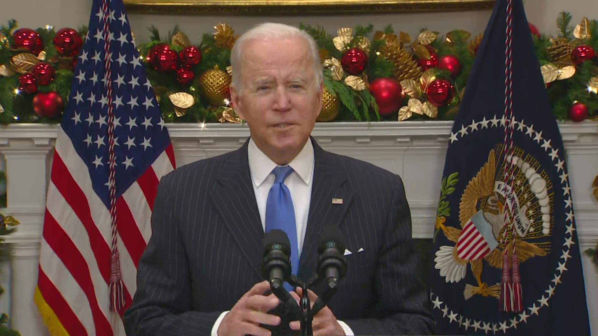 President Joe Biden is urging Americans to get vaccinated including booster shots as he seeks to quell concerns Monday over the new COVID-19 variant.