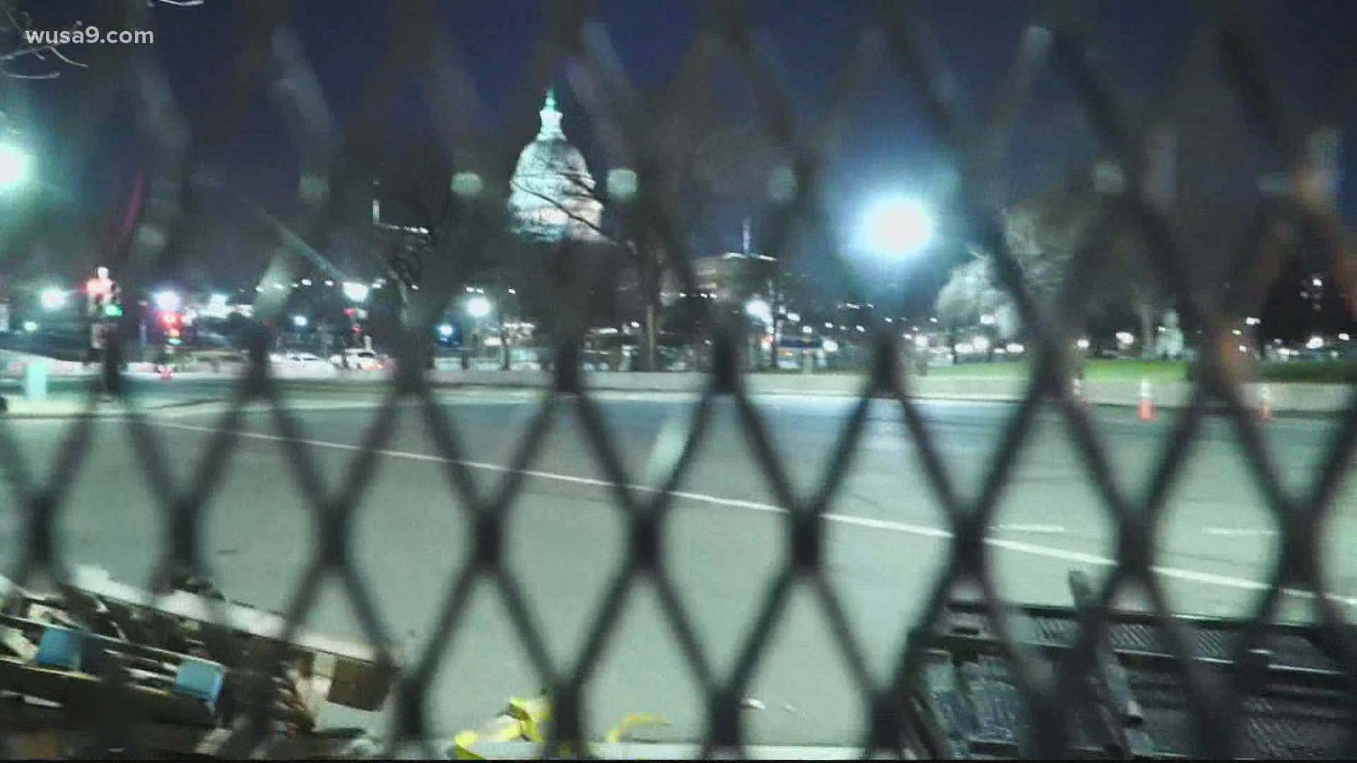 The Capitol is now closed and the National Mall, floodlit, as crews construct an American theater that will largely sit empty on Inauguration Day.